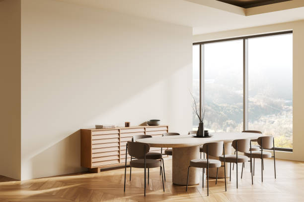 istock Minimalist dining room interior with large window and natural wooden flooring. 3D Rendering 2200178199