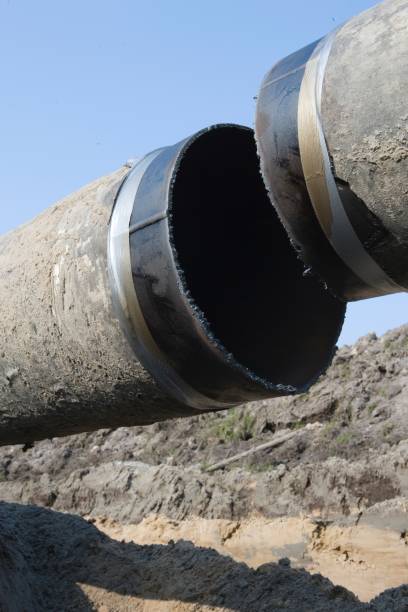 istock Asbestos removal and disposal of a pipeline. 2200180266
