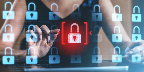 istock Cybersecurity concept showing a hacker attempting to breach a digital padlock system. 2200181427