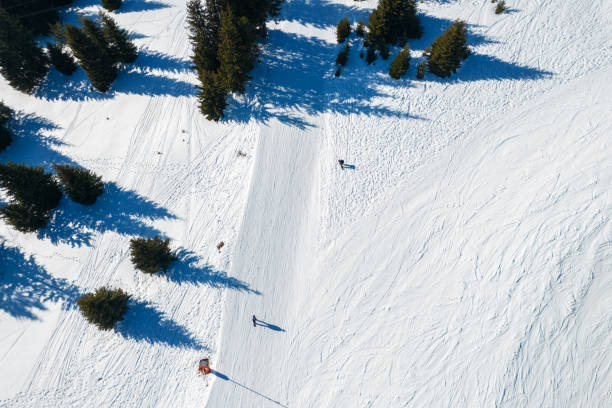 istock Two snowboarders on a ski slope 2200182545