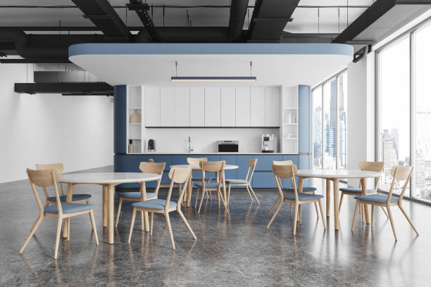 istock Elegant dining area with a modern table and mustard chairs in a bright kitchen space. 3D Rendering 2200183831
