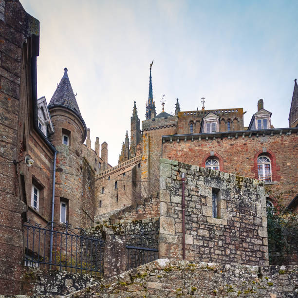 Mont Saint-Michel, France - January 25, 2016: A stunning view of the medieval architecture and stone buildings of the historic island commune.