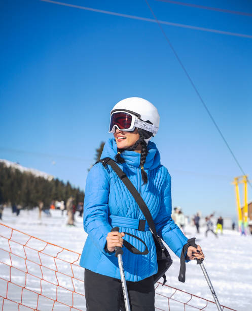 istock Female Skier on snowy hill 2200187550