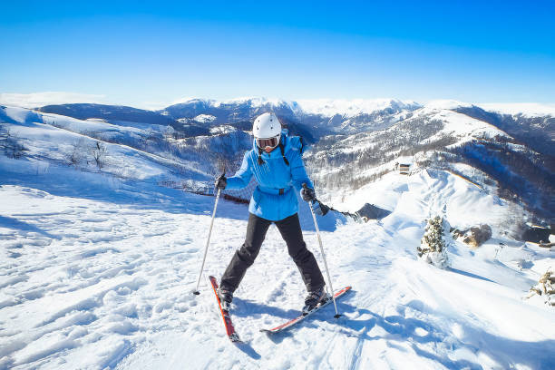 istock Female Skier on snowy hill 2200189451
