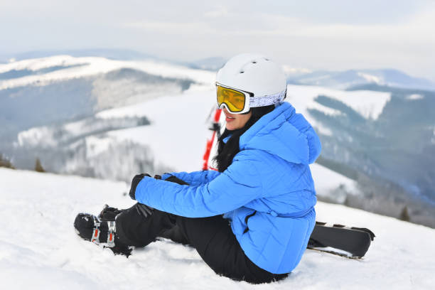 istock Female Skier on snowy hill 2200189502