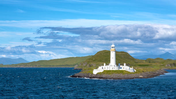 istock Panoramic view of the Lismore Lighthouse, Eilean Musdile, Inner Hebrides. The lighthouse can be seen at the entrance to Loch Linnhe from the Oban to Mull ferry. 2200189852