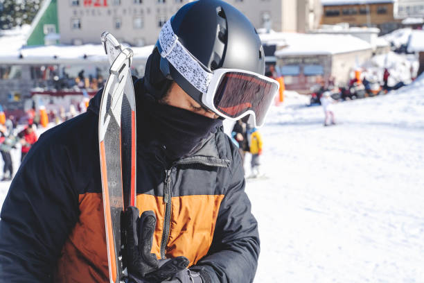 istock Male skier on snowy hill 2200190069