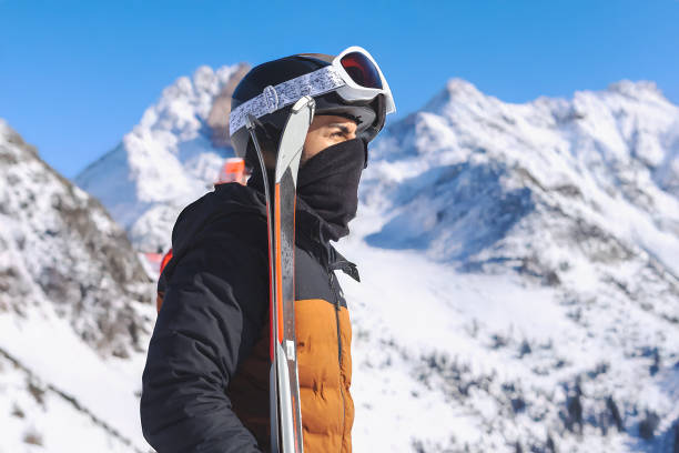 istock Male skier on snowy hill 2200190403