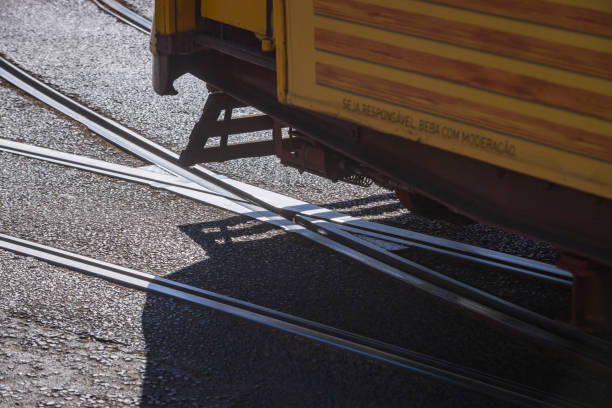 rails for Lisbon's characteristic trams in the road; Lisbon, Portugal