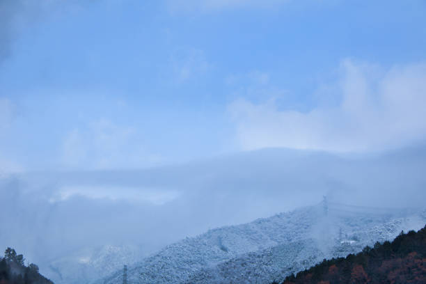 Snow-capped mountain with snow only on the top