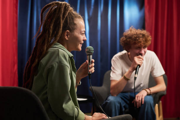 istock Engaging in Podcast Dialogue in Recording Studio 2200195892