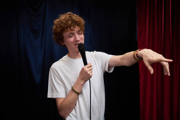 istock Performing Stand-Up Comedy on Stage with Microphone 2200195934