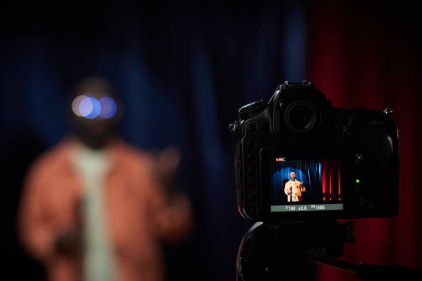 istock Recording Person Under Soft Light with Camera Equipment 2200196010