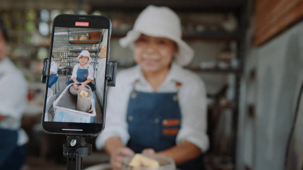 istock Senior Woman Live Streaming Pottery Making in an Artisan Workshop 2200199636