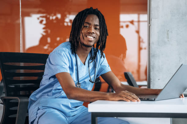 istock Positive and friendly. Black man doctor is in the office 2200202703
