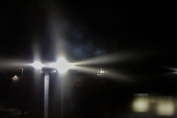 istock abstract bright lights at night blur bokeh illumination motion lamppost city dark backdrop 2200203462