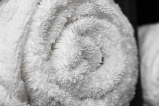 istock close-up of a single rolled white clean towel full frame background 2200203463