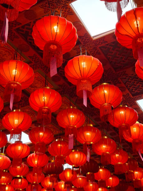 istock Many of red lanterns hanging on ceiling. Chinese temple. 2200204348