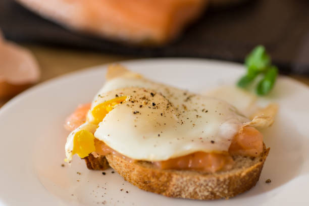istock A slice of bread with lightly salted red fish and a cooked egg for breakfast 2200208547