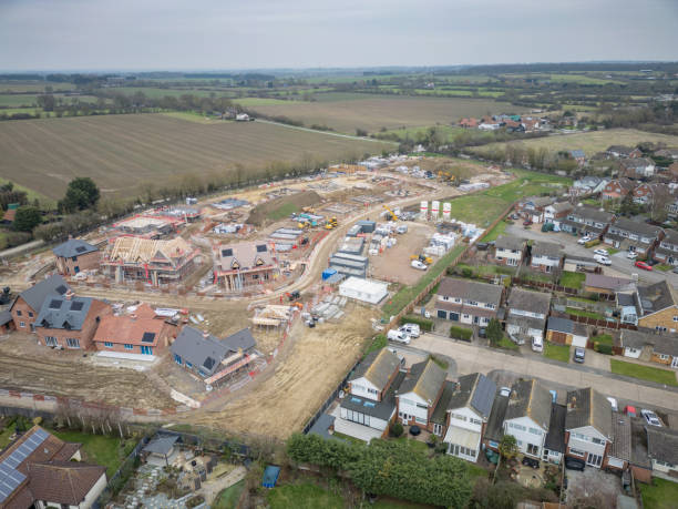 istock Drone view of a new housing development site seen adjacent to an 1970s housing development. 2200208675