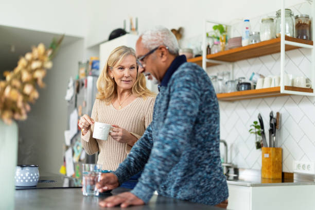 istock Senior Couple Enjoying Coffee at Home 2200209301