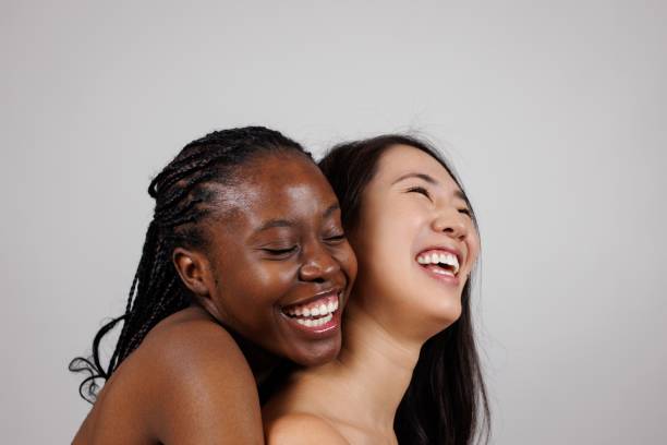 istock Two Naturally Beautiful Women Laughing 2200213124