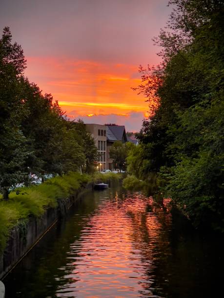 istock Sunset and canal in Haarlem, Netherlands 2200213753