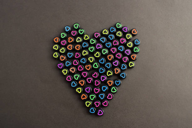 Many colorful hearts forming a bigger one