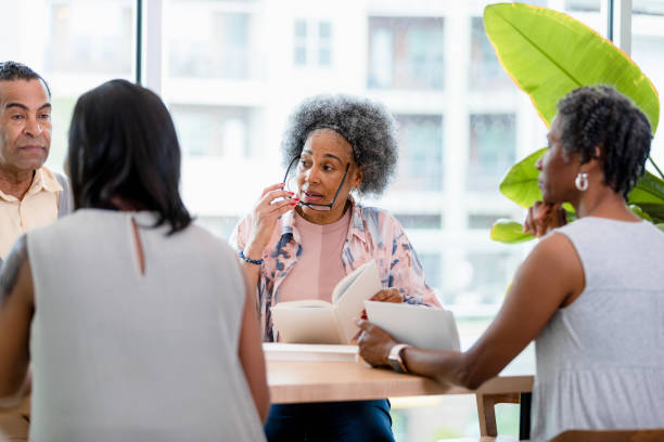 istock Group Therapy Session: Diverse Women Discussing Mental Health 2200217268