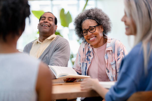 istock Joyful Multiracial Group in Book Club Meeting 2200217286