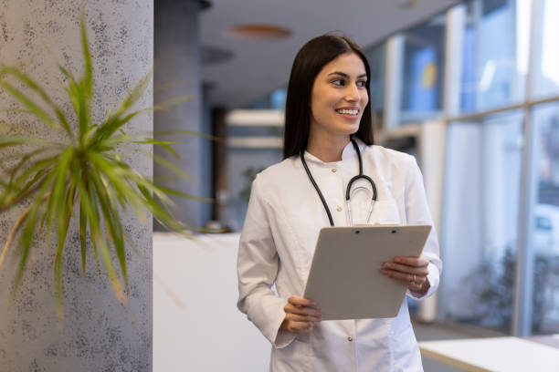 istock Confident young Latina medical expert in a modern hospital setting 2200217355