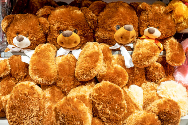 istock cute brown teddy bears cuddled together on a supermarket counter. Environment 2200230295