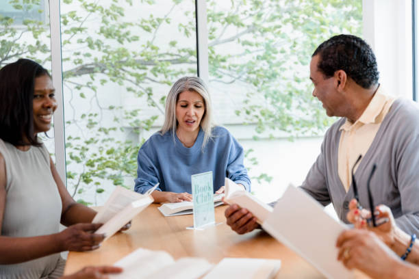 istock Diverse Book Club Members Engaging in Lively Discussion 2200232515