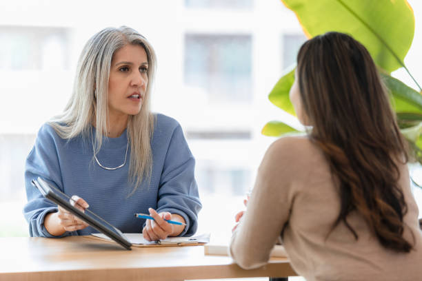 istock Mental Health Professional Counseling Patient,  Therapy Session 2200232534