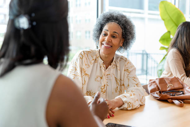 istock Two Women Talking, Casual Meeting,  Indoor Setting 2200232541