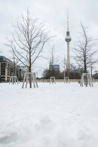 istock Snow-covered landscape featuring Berlin TV Tower in winter 2200233991