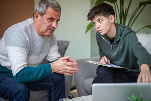 istock Psychotherapy, an elderly man in a psychotherapy session 2200235226