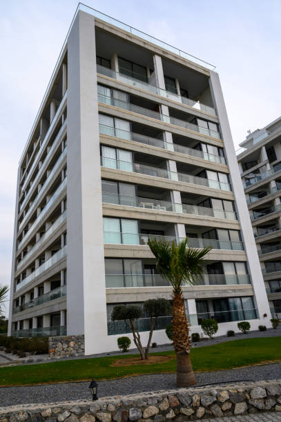 istock Modern architectural marvel stands tall against a cloudy sky in a vibrant urban setting 2200236630