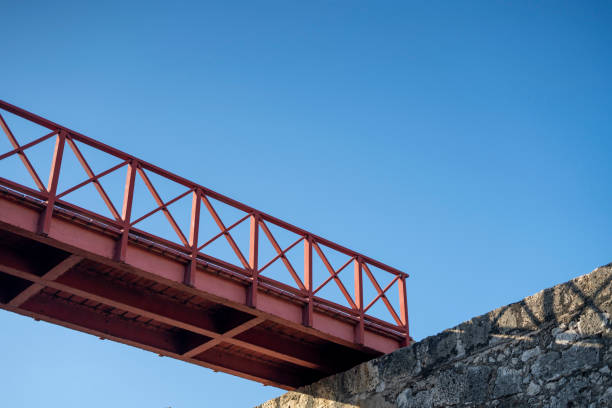 A beautiful bridge spanning the historic walls of Cartagena, offering a stunning view of the city in the background.