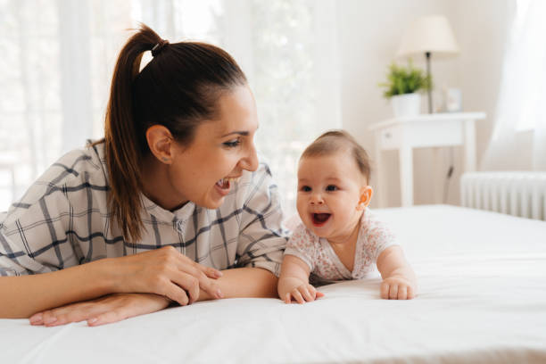istock A joyful moment between a mother and her baby. 2200246454
