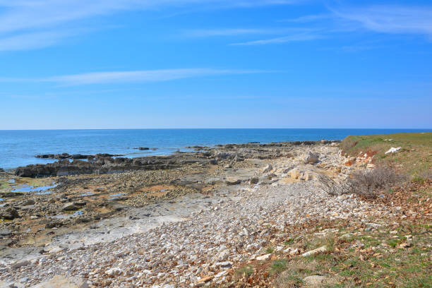 istock A beautiful rocky beach with the vast ocean stretching in the background 2200246739
