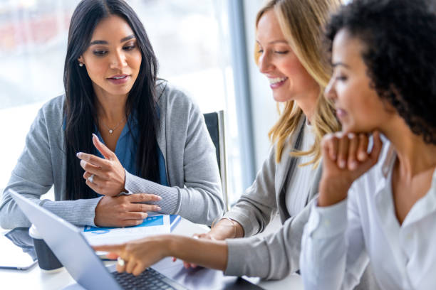 istock Three business  women meeting. 2200249471