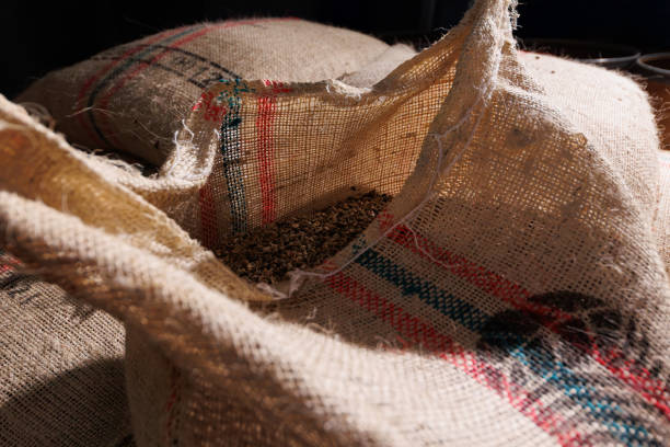 Burlap bag with Colombian coffee beans with the inscription \