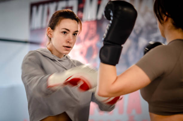istock Two young women training kickboxing 2200251964
