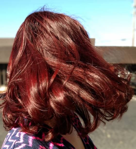 istock Purple hair in the wind 2200257321