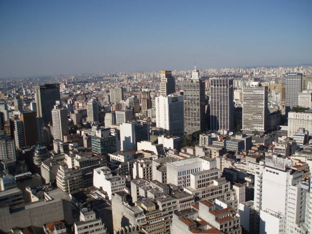 Aerial view of the skyline of Sao Paulo, Brazil.  With skyscrapers Mirante do Vale (170 m tall, inaugurated 1966, left side) and Grande São Paulo (129 m tall, inaugurated 1971) and Mercantil Finasa (129 m tall, inaugurated 1974, both on the right side).