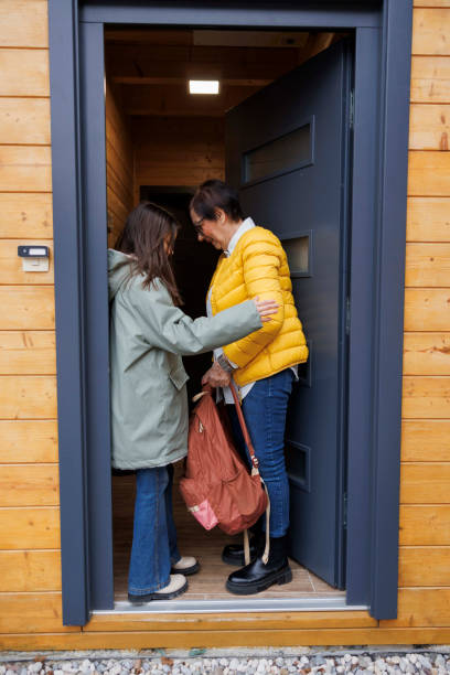 istock Warm Greeting at the Doorway 2200260811