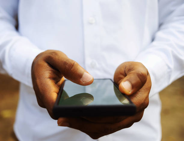 istock A person holding a smart phone 2200263831