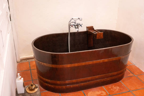 istock Wooden bathtub inside a bathroom 2200264524