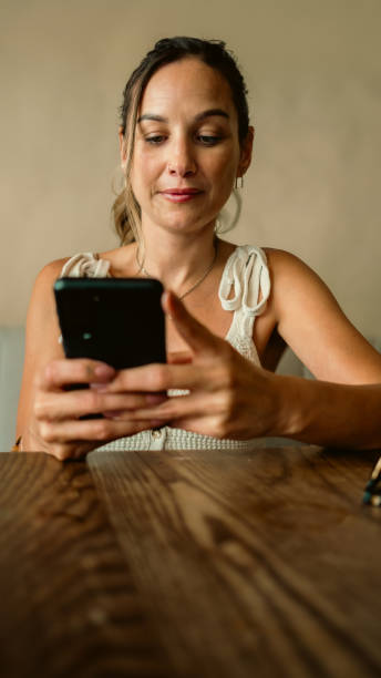 istock Being Cute at a cafe while doing online dating and paying my bills 2200265084